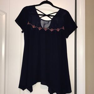 Navy blue blouse with pink Aztec design.